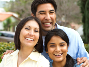 Immigrant family smiling